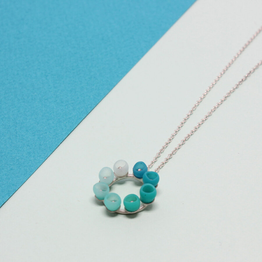 Mini colour fade pendant in sea green fade silicone by Jenny Llewellyn